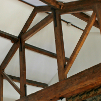 Oak trusses showing adzed finish on beam