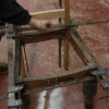 Example of ongoing restoration work on an old carved chair in oak