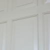 Example of field and raised wall panelling with cockbead surround