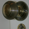 Interior bronze door handle and toilet escutcheon