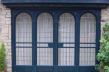 Arched painted periodic window front